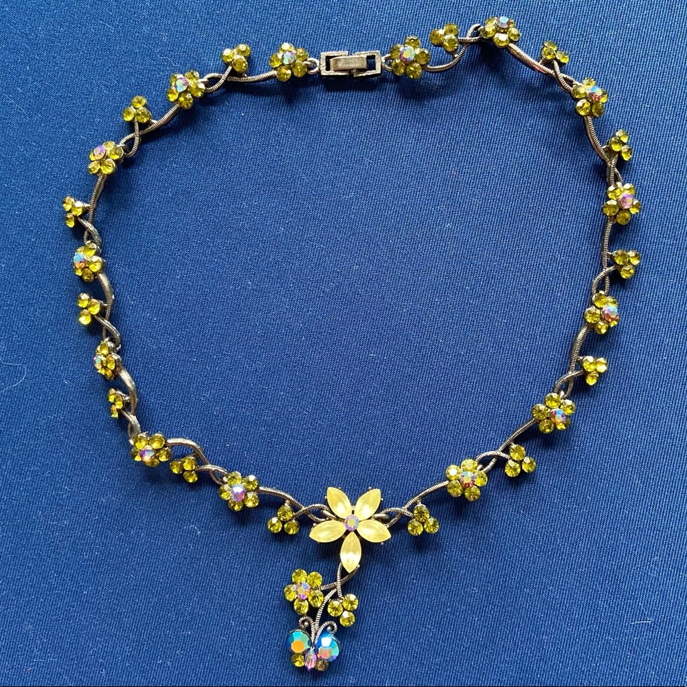 Flowers and a butterfly gem Avon necklace